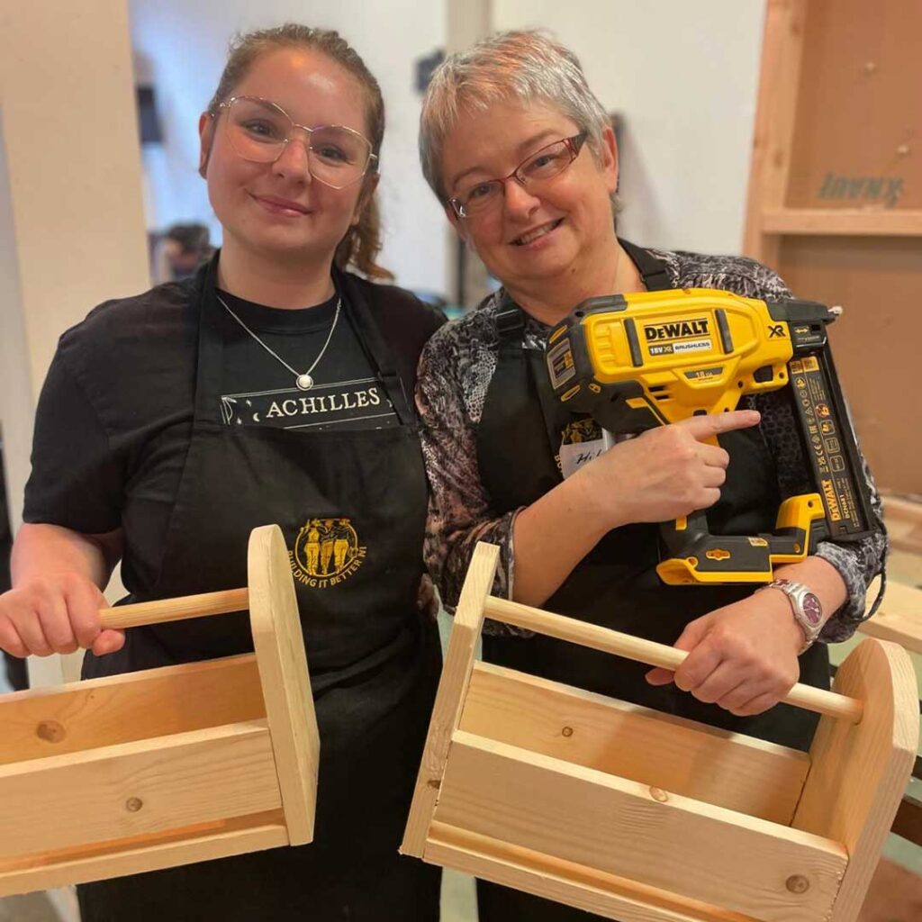 Mother-and-daughter-holding-their-projects from one of the diy classes for women