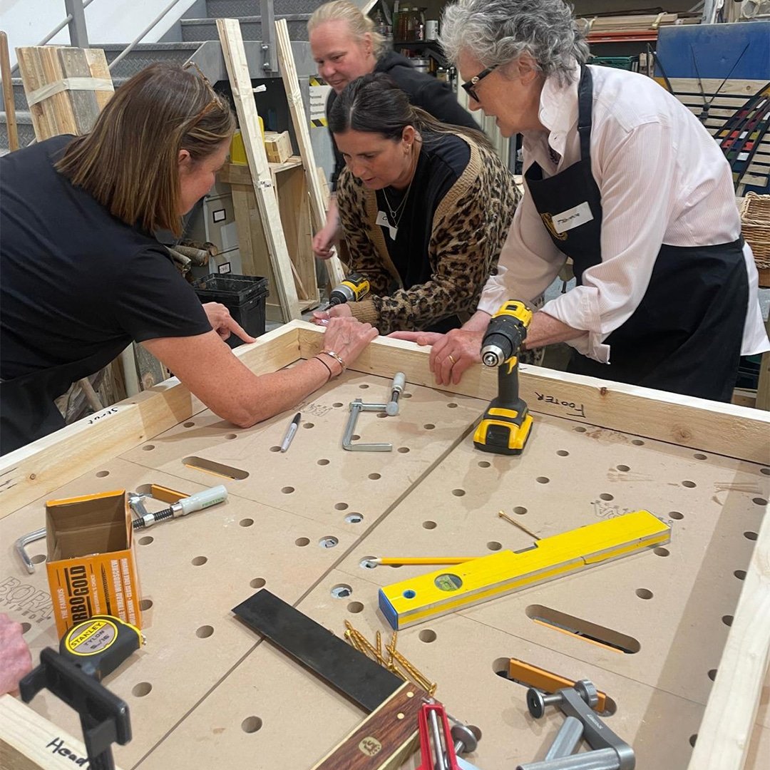 Students taking part in a practical DIY course with Building It Better NI