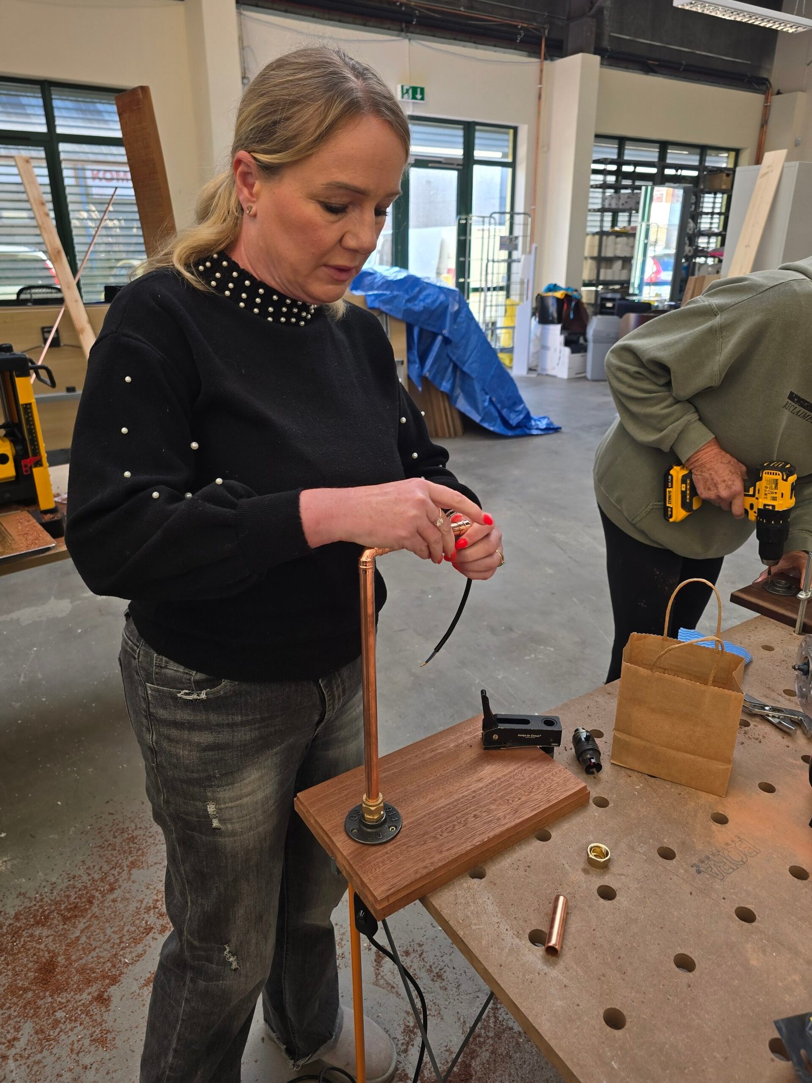 Participants taking part in a Building It Better NI electrics course